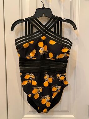 Black One-Piece Swimsuit with Yellow Lemon Print and Strappy Cross-Back